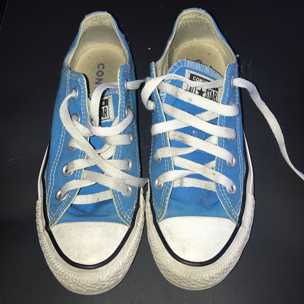 Light blue, low top Converse shoes